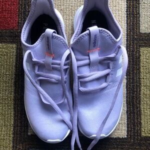 Women’s size 9 Adidas slip on lavender sneaker.